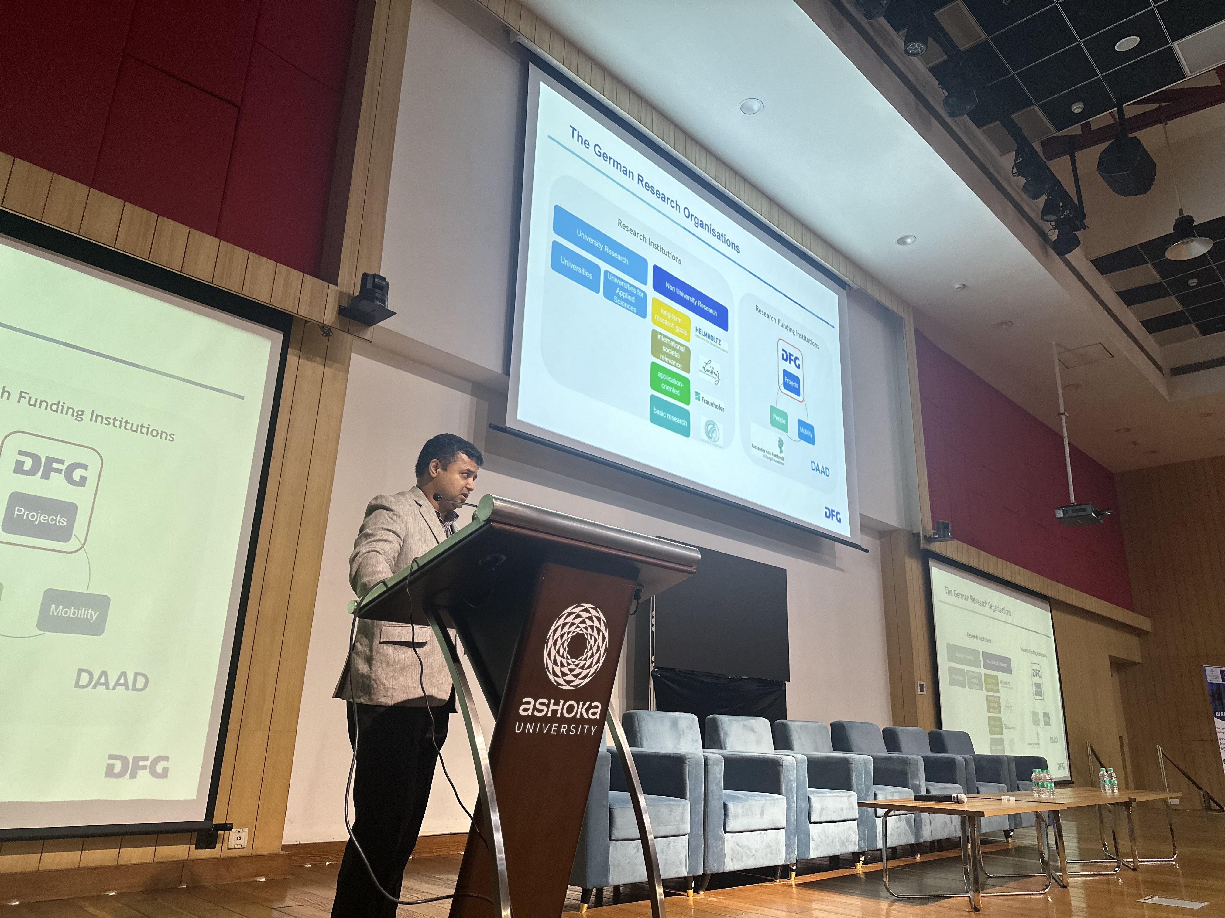 Dr. Vaibhav Agarwal is standing at the lectern