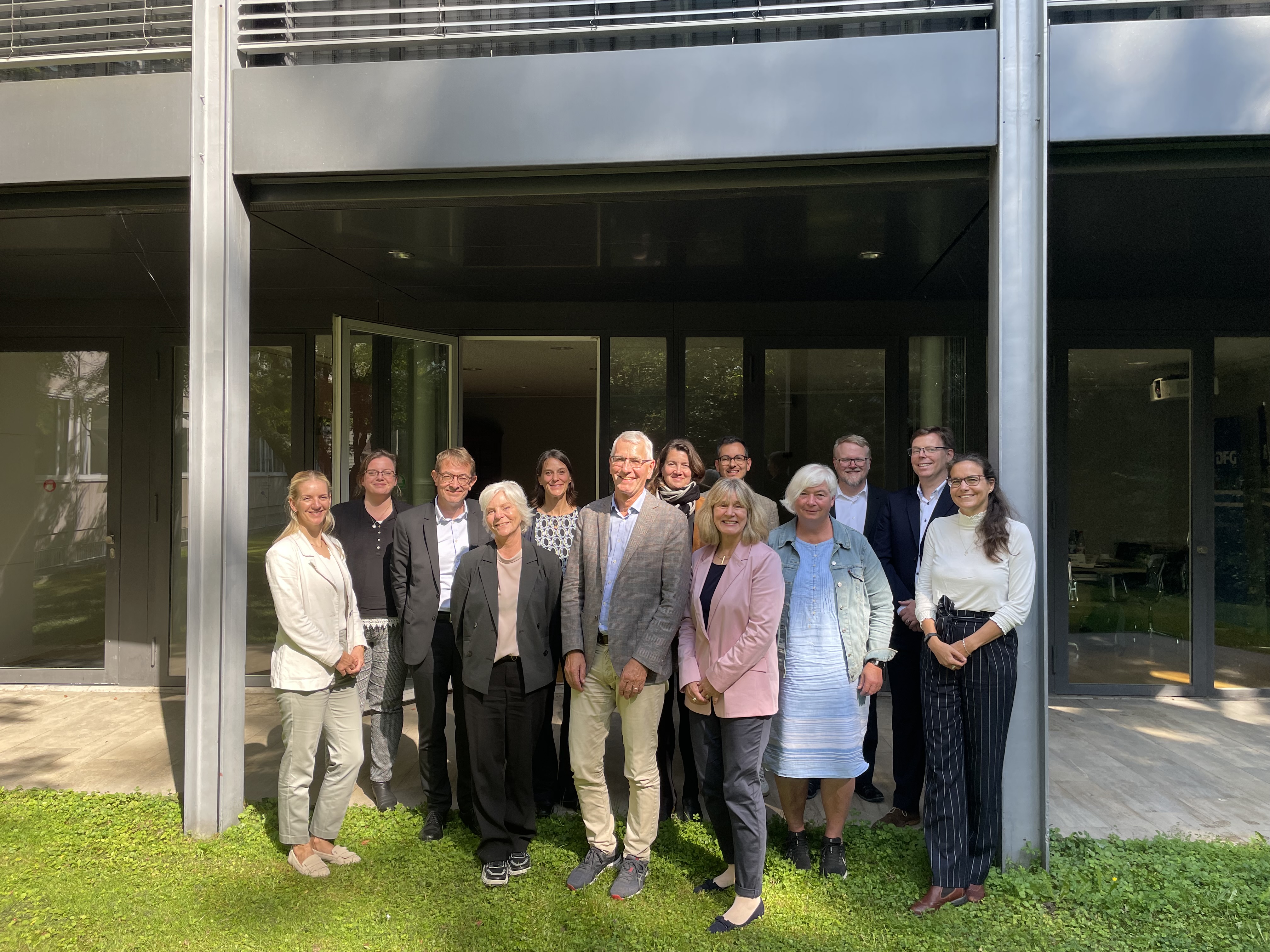 Group photo in front of the Head Office in Bonn